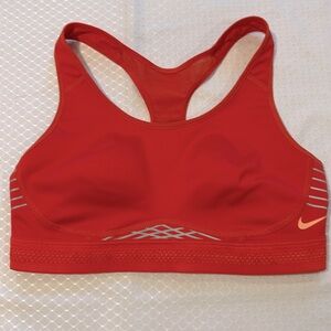 Nike sports bra, built in bra cups stay in place, reflective